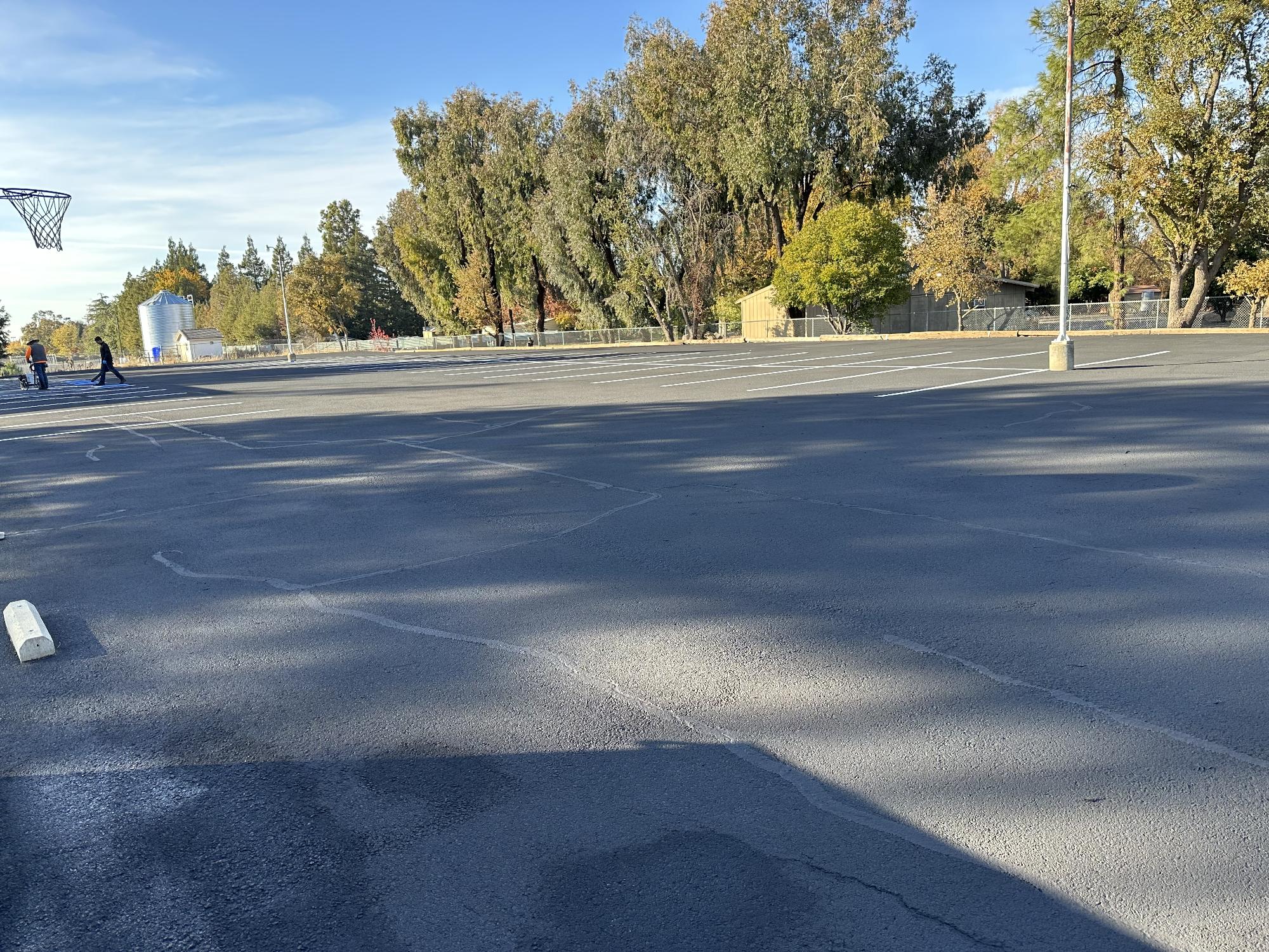 Detailed view of sealcoated pavement by HT Paving and Sealcoating.