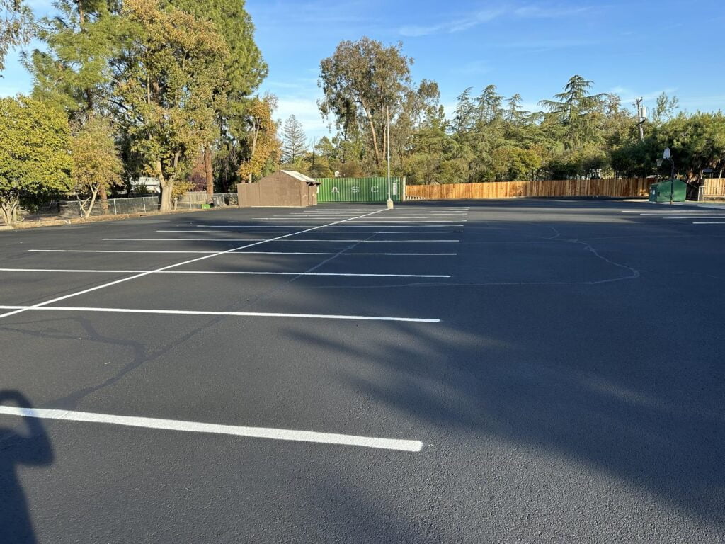 Parking lot sealcoating for protection and aesthetics by HT Paving and Sealcoating. Projects - Parking Lot Striping Millbrae CA