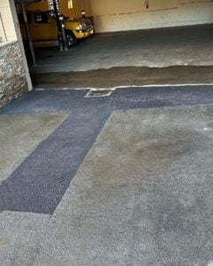 Completed asphalt crack filling work.