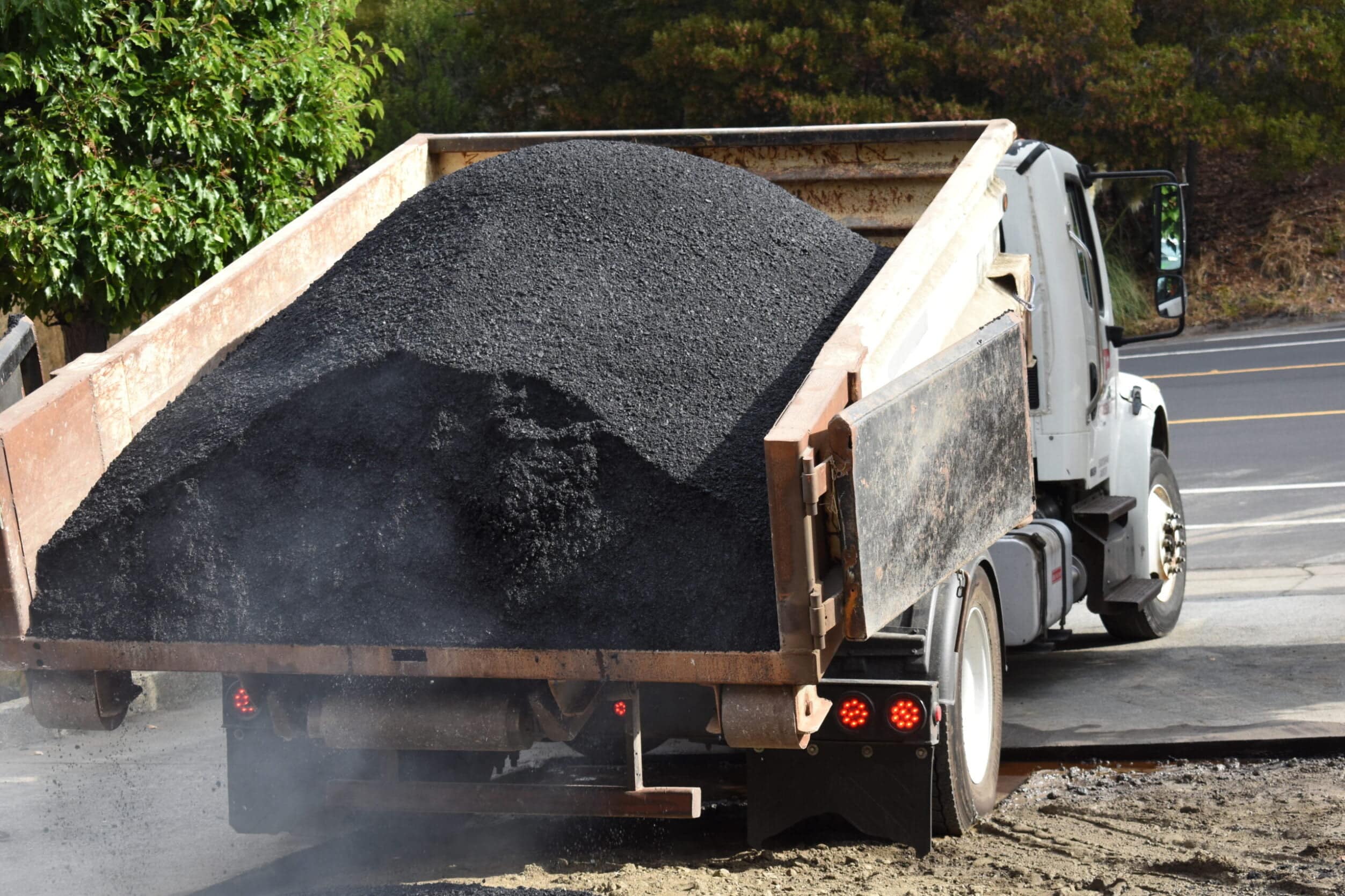 Backyard and Driveway Paving HT services - Pavement - Asphalt repair