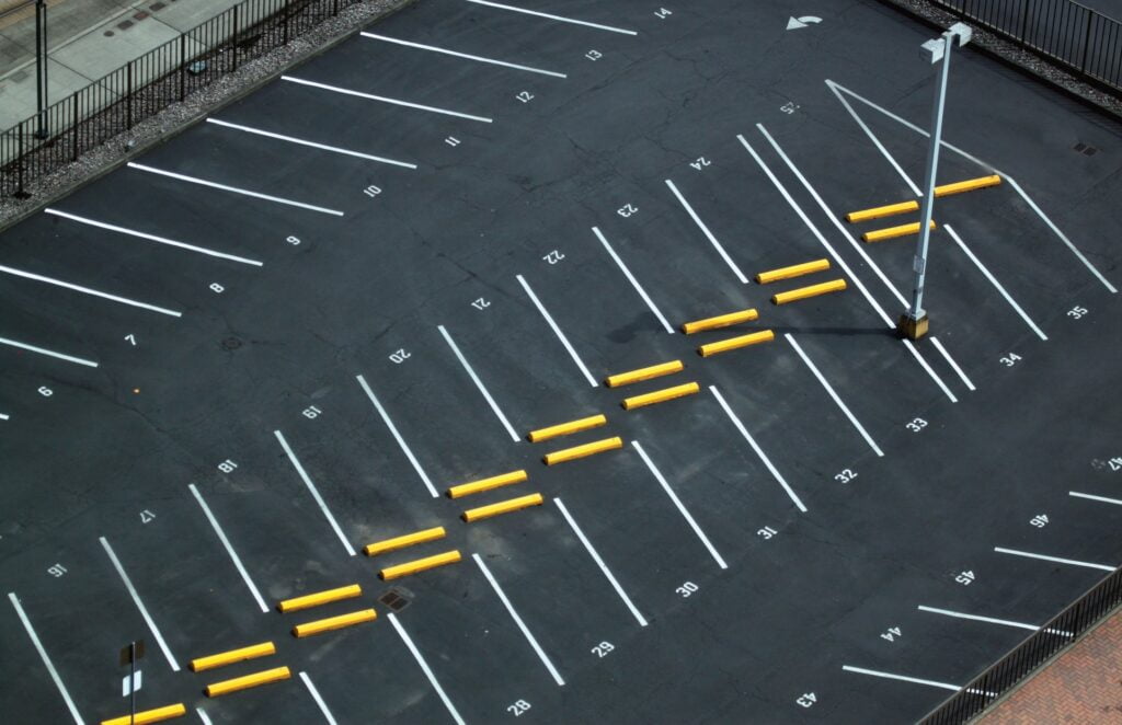 Accurate line striping for efficient use of parking spaces - Parking Lot Striping